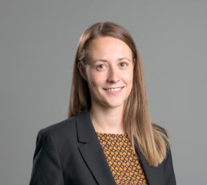 Photo of Rebecca Larson with grey background