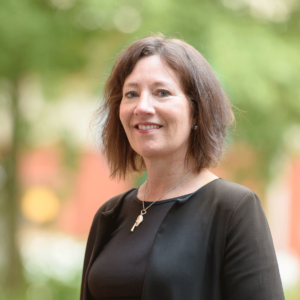 Ann-Louise Larsson with trees in background