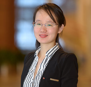 Xina Lang on orange background