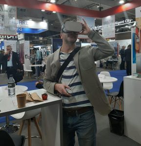 Visitor in Barcelona trying the Smart City Sweden VR experience