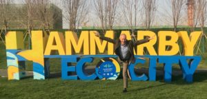 Jonas Törnblom in front of Hammarby eco city sign