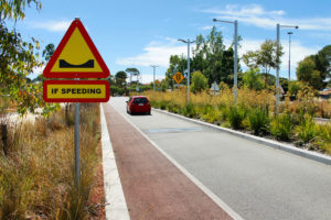 Car driving on road with Actibump