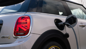 Electric Mini Cooper car being charged