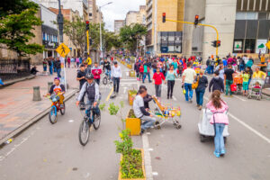 People walking and biking in the street