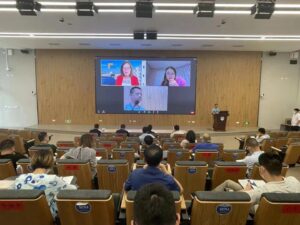 People listening to a digital presentation