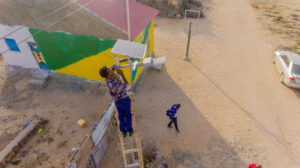 Man putting up solar panels in Somaliland