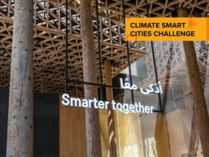 The Swedish Pavilion in Dubai with text 'Smarter together' in English and Arabic