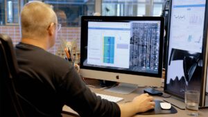 Man in front of computer