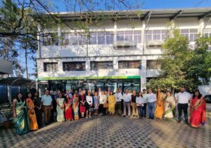 Delegation in front of bus