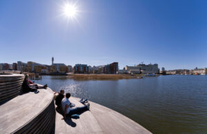 People on solar deck in Hammarby sjöstad