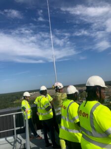Delegation looking out over land